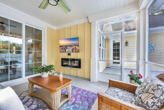 2336 Tidewatch Way N, Myrtle Beach, SC 29582 - sunroom featuring ceiling fan and a glass covered fireplace
