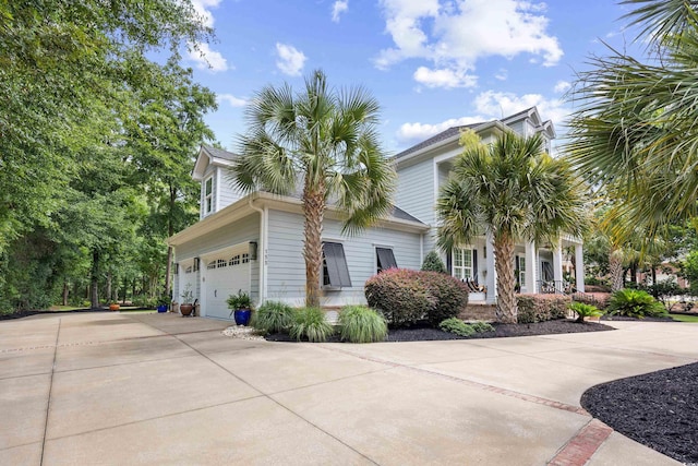 155 Preservation Cir, Pawleys Island, SC 29585 - view of side of home featuring driveway