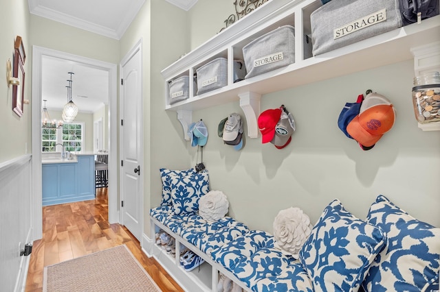 155 Preservation Cir, Pawleys Island, SC 29585 - mudroom with ornamental molding, light wood-type flooring, and a chandelier