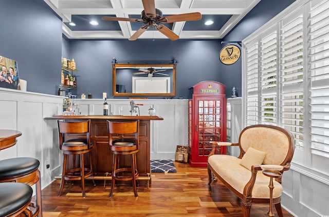 155 Preservation Cir, Pawleys Island, SC 29585 - indoor wet bar with ceiling fan, coffered ceiling, wood finished floors, a decorative wall, and beam ceiling