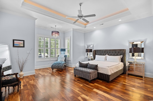 155 Preservation Cir, Pawleys Island, SC 29585 - bedroom featuring a raised ceiling, ornamental molding, hardwood / wood-style floors, a chandelier, and recessed lighting