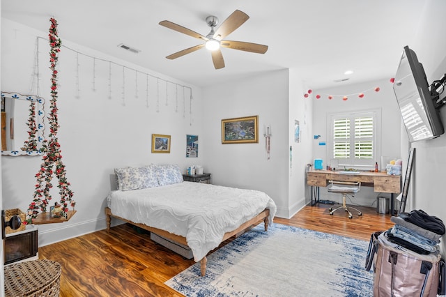 155 Preservation Cir, Pawleys Island, SC 29585 - bedroom featuring wood finished floors, a desk, and ceiling fan