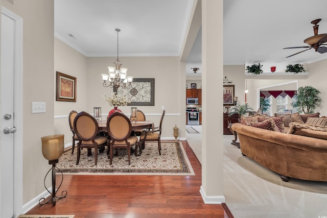 327 Trestle Way, Conway, SC 29526 - dining room featuring crown molding, wood finished floors, a ceiling fan, and a chandelier