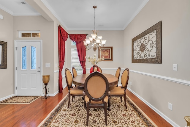 327 Trestle Way, Conway, SC 29526 - dining room featuring wood finished floors, a chandelier, and ornamental molding