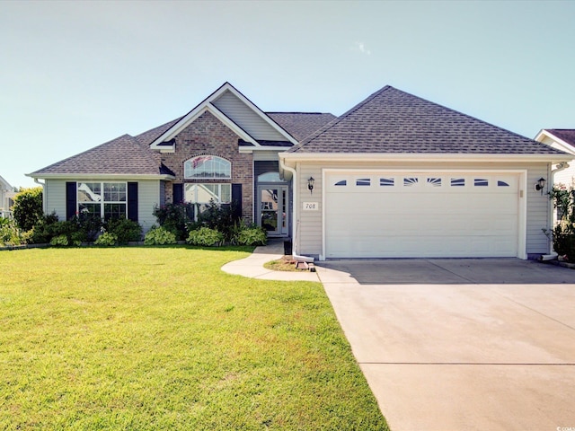 708 Shenanigan Loop, Murrells Inlet, SC 29576 - ranch-style house featuring concrete driveway, an attached garage, a front yard, brick siding, and a shingled roof