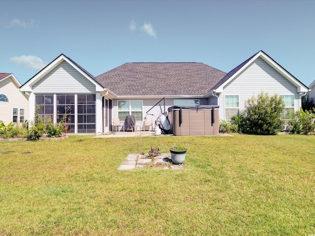 708 Shenanigan Loop, Murrells Inlet, SC 29576 - back of house with a sunroom, a yard, a patio, and roof with shingles