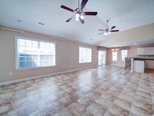 708 Shenanigan Loop, Murrells Inlet, SC 29576 - unfurnished living room featuring lofted ceiling, a chandelier, and ceiling fan