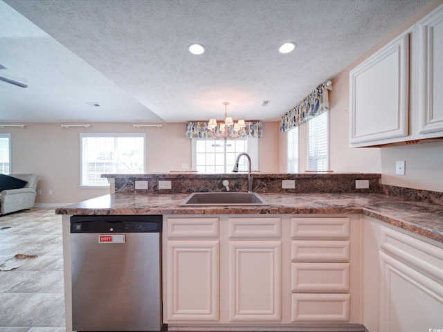 708 Shenanigan Loop, Murrells Inlet, SC 29576 - kitchen featuring stainless steel dishwasher, a chandelier, a textured ceiling, healthy amount of natural light, and open floor plan