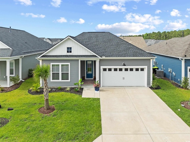 6304 Chadderton Cir, Myrtle Beach, SC 29579 - view of front of home featuring board and batten siding, a garage, a front lawn, concrete driveway, and roof with shingles