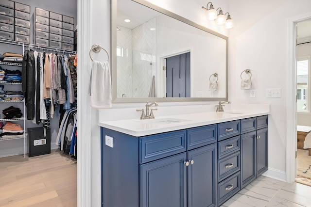 6304 Chadderton Cir, Myrtle Beach, SC 29579 - full bath featuring double vanity, a walk in closet, a shower with shower door, and marble finish flooring