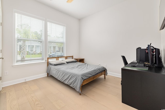 6304 Chadderton Cir, Myrtle Beach, SC 29579 - bedroom featuring light wood-style floors, a desk, and ceiling fan