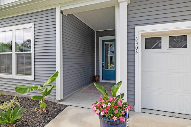 6304 Chadderton Cir, Myrtle Beach, SC 29579 - view of exterior entry featuring a garage