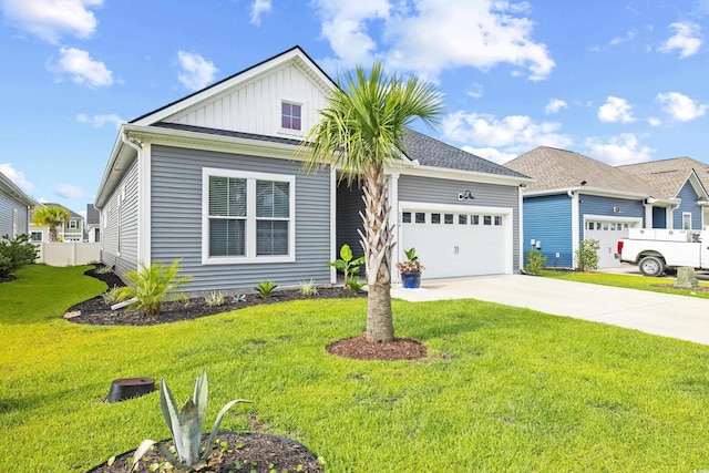 6304 Chadderton Cir, Myrtle Beach, SC 29579 - view of front facade featuring board and batten siding, a garage, concrete driveway, and a front lawn