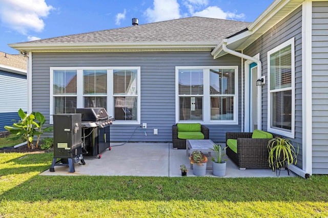 6304 Chadderton Cir, Myrtle Beach, SC 29579 - back of house featuring a lawn, a patio area, and a shingled roof