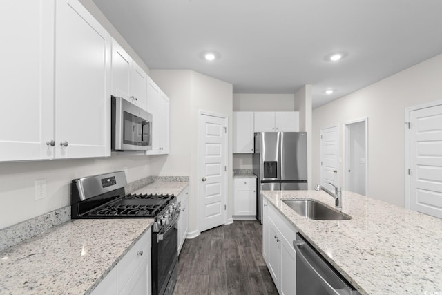 623 Harrison Mill St Unit 623, Myrtle Beach, SC 29579 - kitchen with stainless steel appliances, dark wood-style floors, white cabinetry, recessed lighting, and light stone countertops
