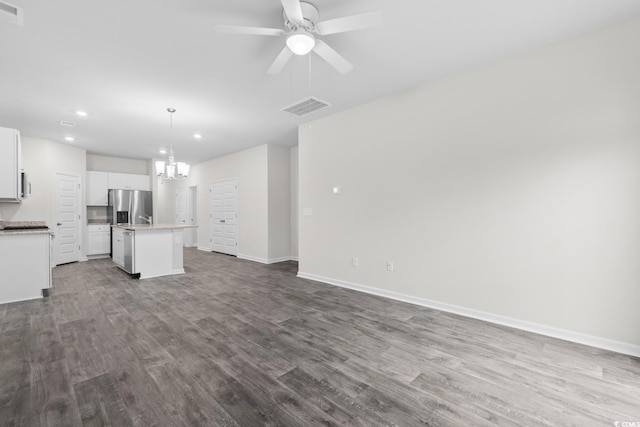 623 Harrison Mill St Unit 623, Myrtle Beach, SC 29579 - unfurnished living room featuring recessed lighting, a chandelier, dark wood finished floors, and a ceiling fan