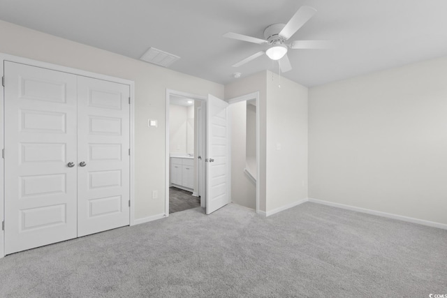 623 Harrison Mill St Unit 623, Myrtle Beach, SC 29579 - unfurnished bedroom with carpet flooring, a closet, connected bathroom, and a ceiling fan