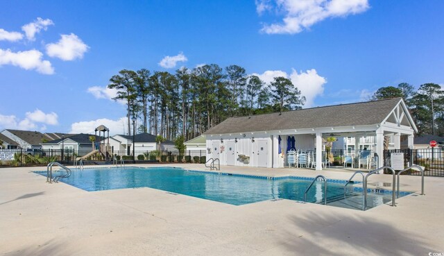 623 Harrison Mill St Unit 623, Myrtle Beach, SC 29579 - community pool with a patio area