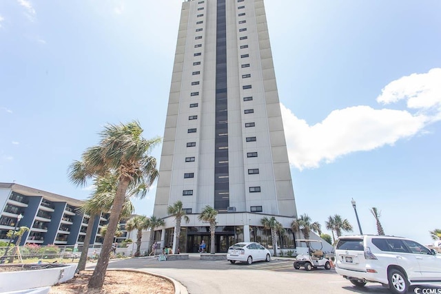 5905 S Kings Hwy Unit 1414, Myrtle Beach, SC 29575 - view of apartment building / complex featuring uncovered parking