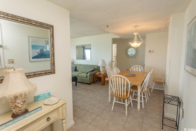 5905 S Kings Hwy Unit 1414, Myrtle Beach, SC 29575 - dining area featuring light tile patterned floors and a textured ceiling