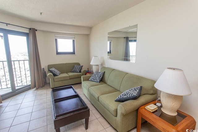 5905 S Kings Hwy Unit 1414, Myrtle Beach, SC 29575 - living area with light tile patterned flooring and a textured ceiling