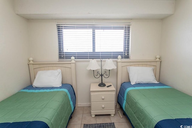 5905 S Kings Hwy Unit 1414, Myrtle Beach, SC 29575 - bedroom featuring multiple windows and light tile patterned floors