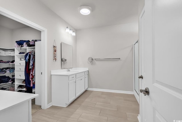520 Cattle Drive Cir, Myrtle Beach, SC 29588 - full bath with vanity, a walk in closet, and a shower stall