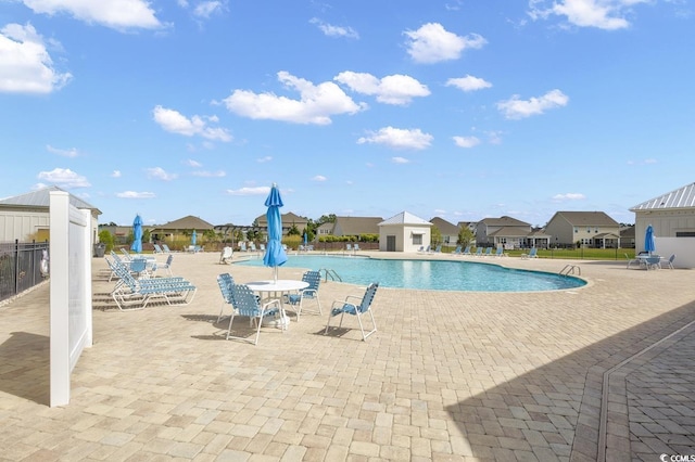 520 Cattle Drive Cir, Myrtle Beach, SC 29588 - community pool with a patio and a residential view