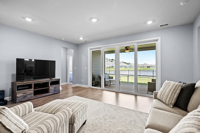 215 Kendrick St, Little River, SC 29566 - living room with wood finished floors and recessed lighting