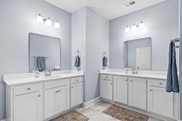 215 Kendrick St, Little River, SC 29566 - full bathroom with marble look tiles and two vanities