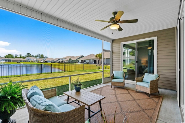 215 Kendrick St, Little River, SC 29566 - sunroom / solarium with ceiling fan, a water view, and a residential view