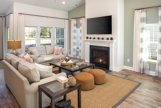 6069 Zoe Way, Myrtle Beach, SC 29588 - living room with wood finished floors, a fireplace with flush hearth, and recessed lighting