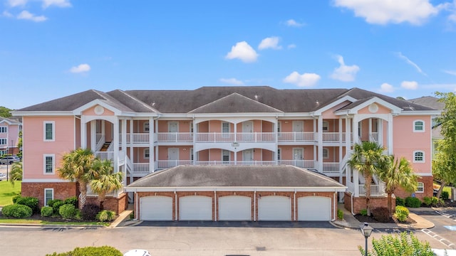 4846 Carnation Cir Unit 301, Myrtle Beach, SC 29577 - view of property featuring community garages
