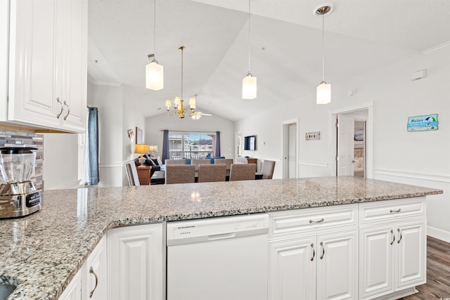 4846 Carnation Cir Unit 301, Myrtle Beach, SC 29577 - kitchen featuring dishwasher, a chandelier, lofted ceiling, light stone countertops, and wood finished floors