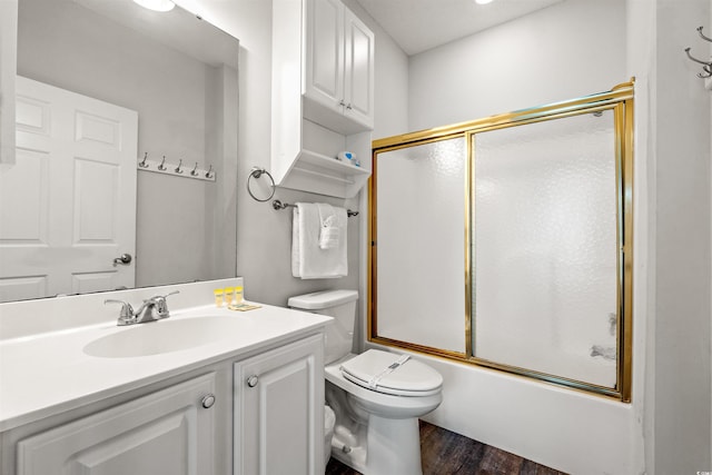 4846 Carnation Cir Unit 301, Myrtle Beach, SC 29577 - bathroom with vanity, bath / shower combo with glass door, and wood finished floors