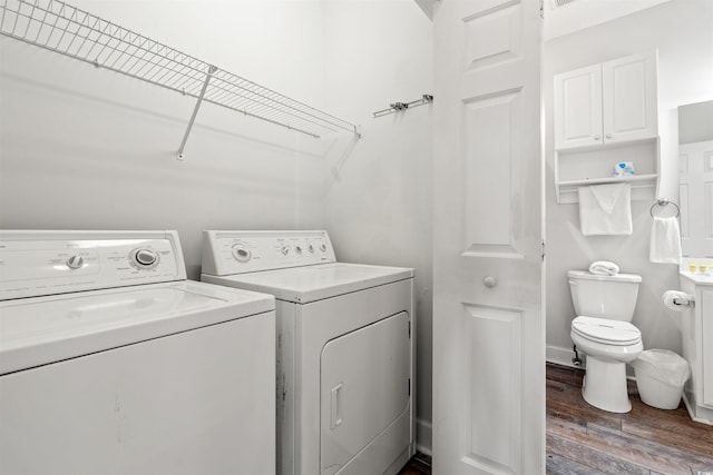 4846 Carnation Cir Unit 301, Myrtle Beach, SC 29577 - washroom with independent washer and dryer and wood finished floors