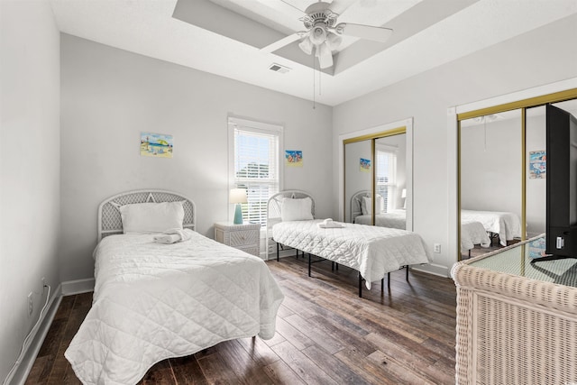4846 Carnation Cir Unit 301, Myrtle Beach, SC 29577 - bedroom with two closets, wood finished floors, and a raised ceiling