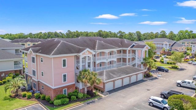 4846 Carnation Cir Unit 301, Myrtle Beach, SC 29577 - view of property with a garage and a residential view