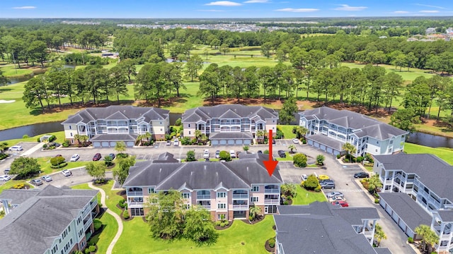 4846 Carnation Cir Unit 301, Myrtle Beach, SC 29577 - drone / aerial view of a large body of water and a golf club