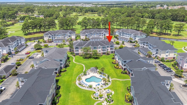 4846 Carnation Cir Unit 301, Myrtle Beach, SC 29577 - aerial perspective of suburban area featuring a pool and a nearby body of water