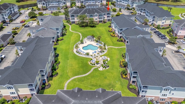 4846 Carnation Cir Unit 301, Myrtle Beach, SC 29577 - aerial perspective of suburban area with a pool and a large body of water