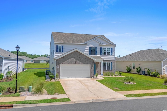 2106 Ainsley Dr, Little River, SC 29566 - traditional-style house featuring brick siding, driveway, a front yard, and a garage