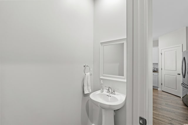 2106 Ainsley Dr, Little River, SC 29566 - bathroom with wood finished floors and a sink