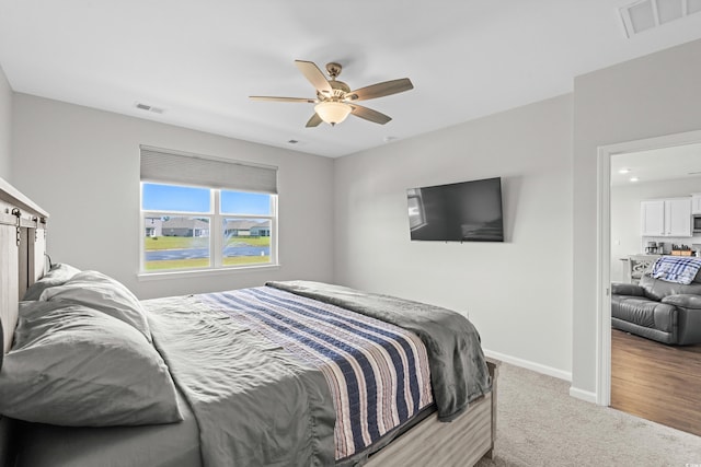2106 Ainsley Dr, Little River, SC 29566 - carpeted bedroom featuring baseboards and a ceiling fan