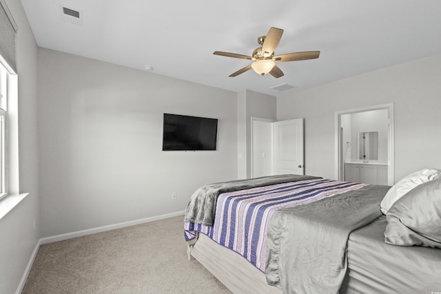 2106 Ainsley Dr, Little River, SC 29566 - carpeted bedroom featuring ceiling fan and connected bathroom