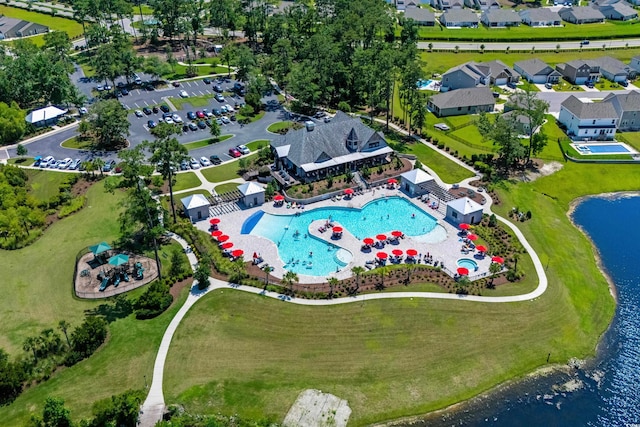 2106 Ainsley Dr, Little River, SC 29566 - aerial view of residential area with a pool and a large body of water