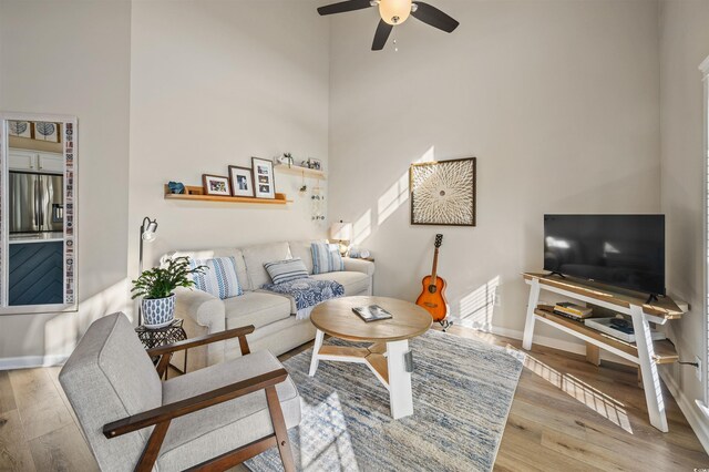 1984 Green Fern Ln Unit 1984, Myrtle Beach, SC 29579 - living room with a towering ceiling, wood finished floors, and ceiling fan