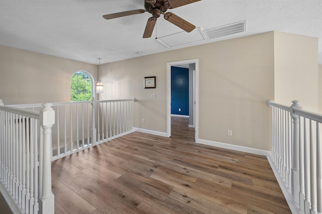 1984 Green Fern Ln Unit 1984, Myrtle Beach, SC 29579 - spare room with ceiling fan, wood finished floors, and a textured ceiling