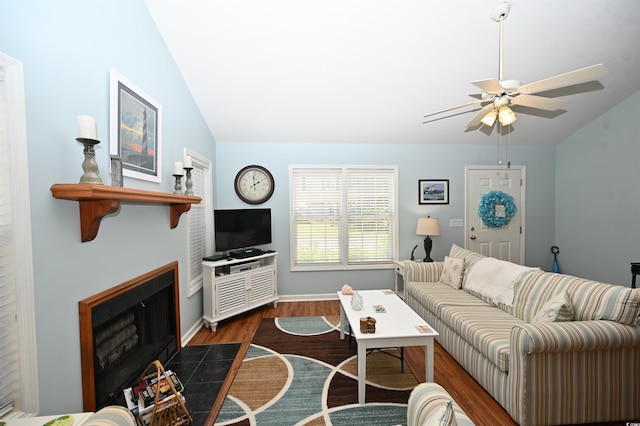 950 Tiffany Ln, North Myrtle Beach, SC 29582 - living area with lofted ceiling, a ceiling fan, dark wood-style floors, and a fireplace with flush hearth
