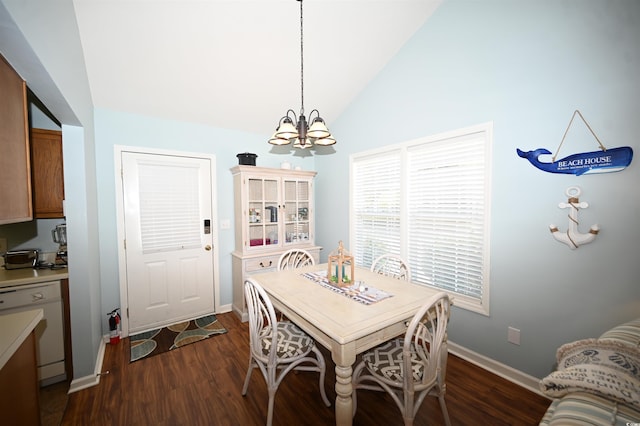 950 Tiffany Ln, North Myrtle Beach, SC 29582 - dining area with a chandelier, dark wood-style flooring, and vaulted ceiling